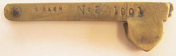 Brass fleam marked Coach no.2 1801 and Proctor on the case and an unusual stamp on the blade.  This was probably used for horses on a coach of fire-team.