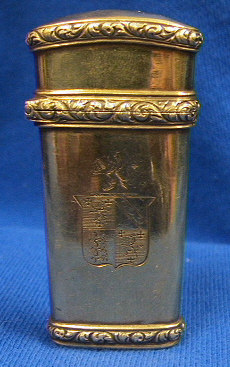 Beautiful gold plated sterling silver lancet case.  The case is marked with a wonderful shield with Lion passants on one side and the initials RCK on the opposite panel.  The 4 toroise shell lancets are marked with either Stodart or a crown and star.  Research is still in process on the family crest.