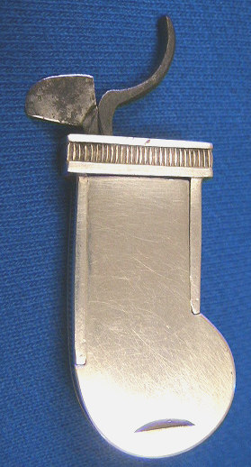 Beautiful silver cased bar release spring lancet.  The item is contained in a red leather case with gold trim.  The release is ornately tooled.  The inside of the case is marked Jackson Baltimore.  A similar item is seen on Bob Greenspan's site and is thought to have been  created by Samuel Jackson the silversmith.